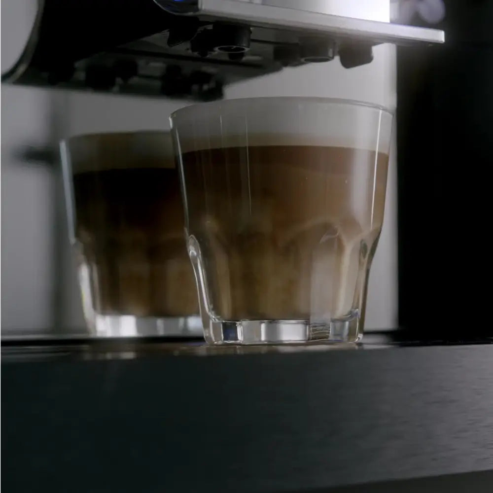 Bestir BM80 preparing fresh lattes with beans visible in the hopper.