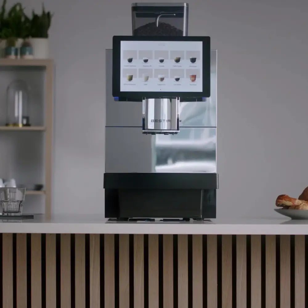 Bestir BM80 bean-to-cup coffee machine on office counter with touchscreen display.