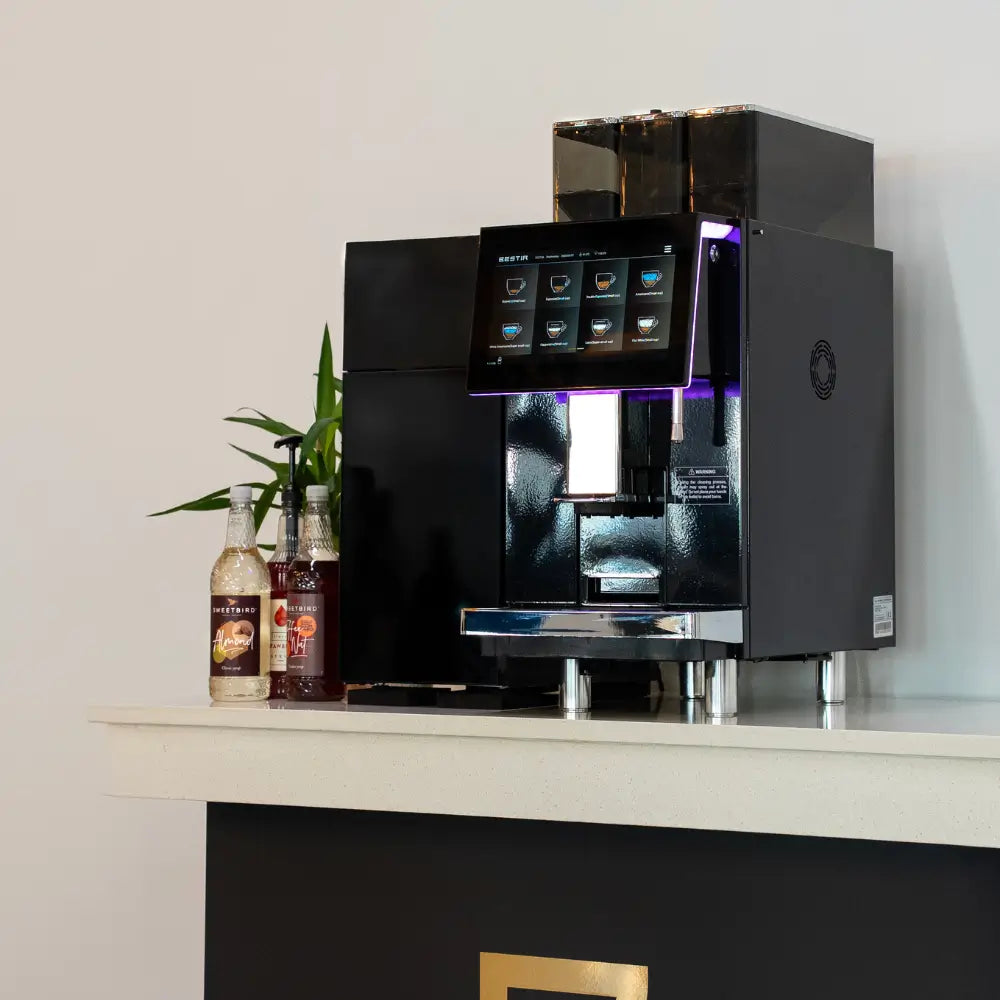 Bestir BMC300 bean to cup coffee machine displayed on counter with touchscreen menu