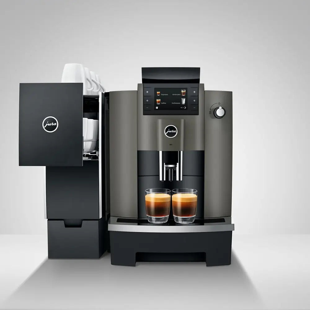 Jura W4 automatic coffee machine shown with the optional Jura cup warmer accessory unit.