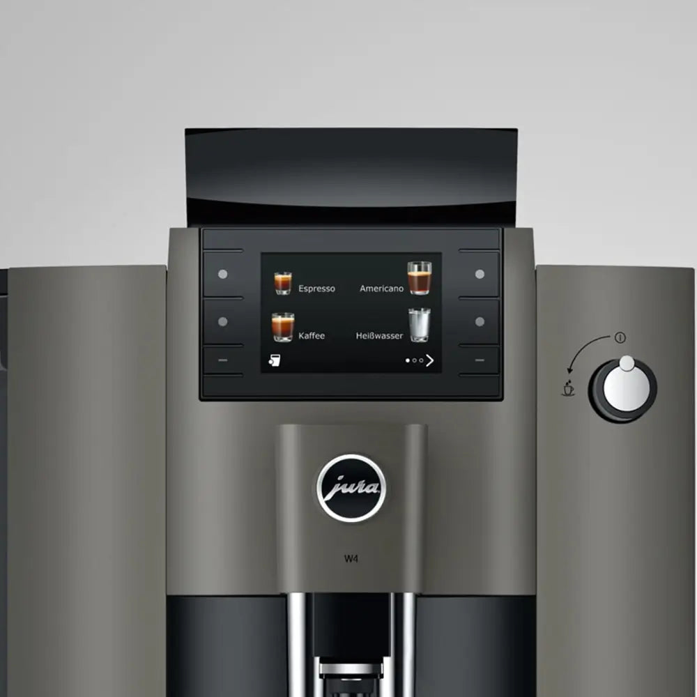 Close-up of the Jura W4 coffee machine touchscreen with drink selection menu.