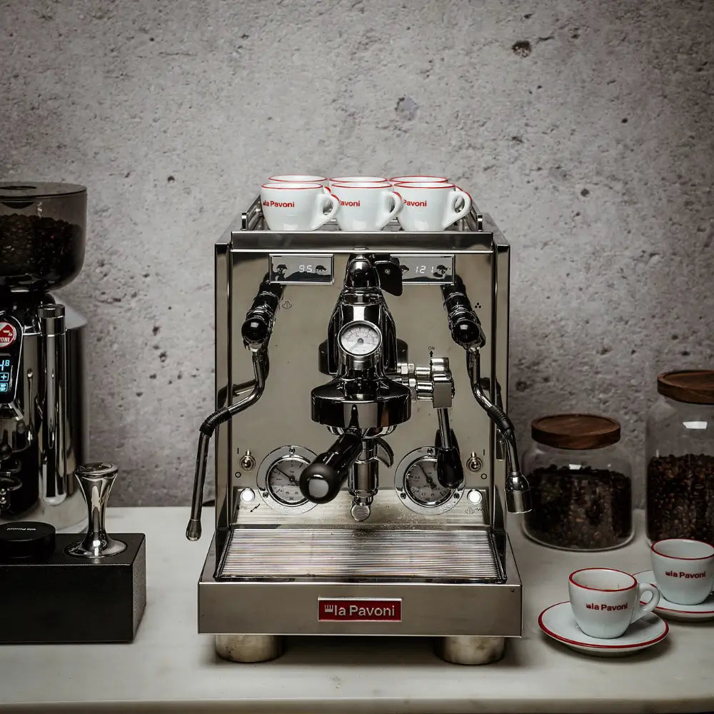 La Pavoni Botticelli Specialty machine on a home counter with espresso cups and accessories.