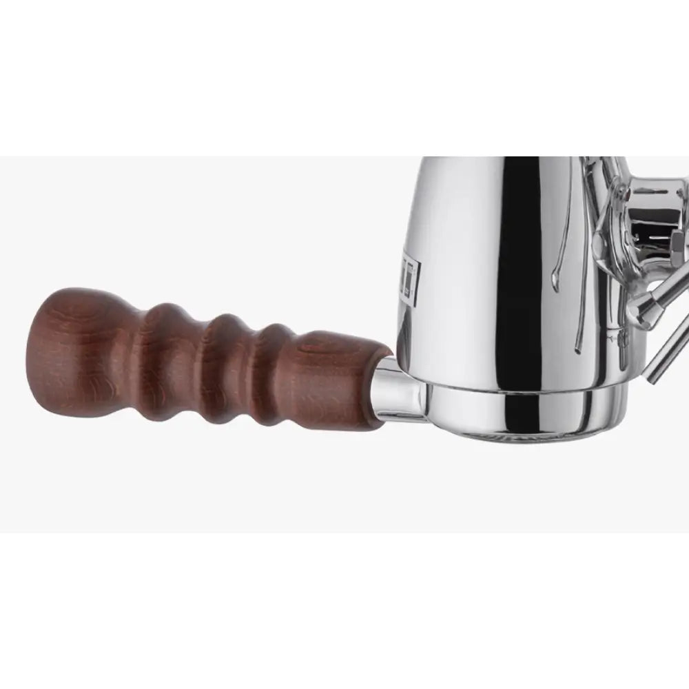 A close-up of the wooden handle on the portafilter of the La Pavoni Esperto Abile