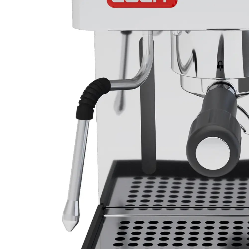 A detailed shot of the steam wand and removable stainless steel drip tray on the Lelit Anita.