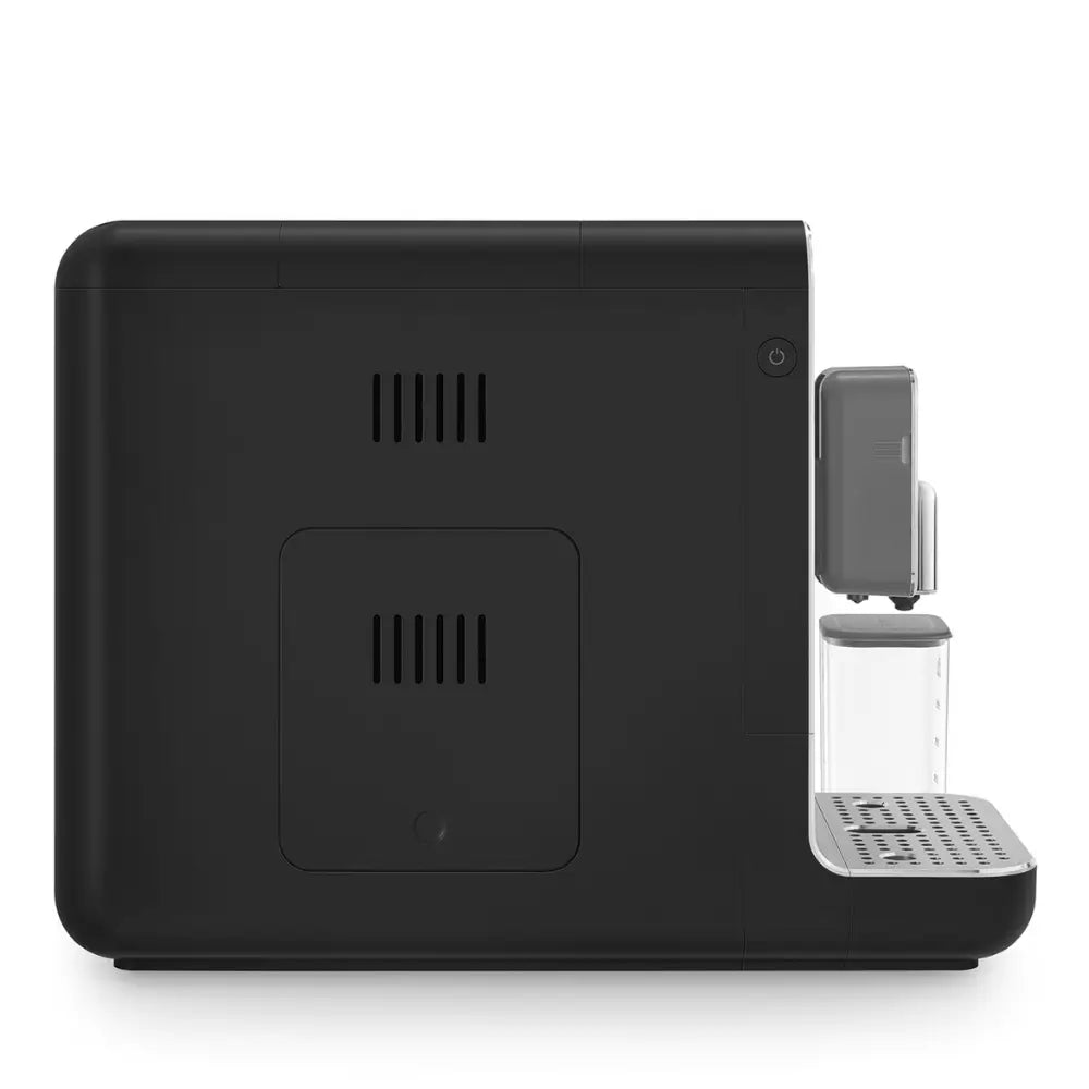 Right side profile of the black SMEG BCC13 bean-to-cup machine, emphasizing its compact design.