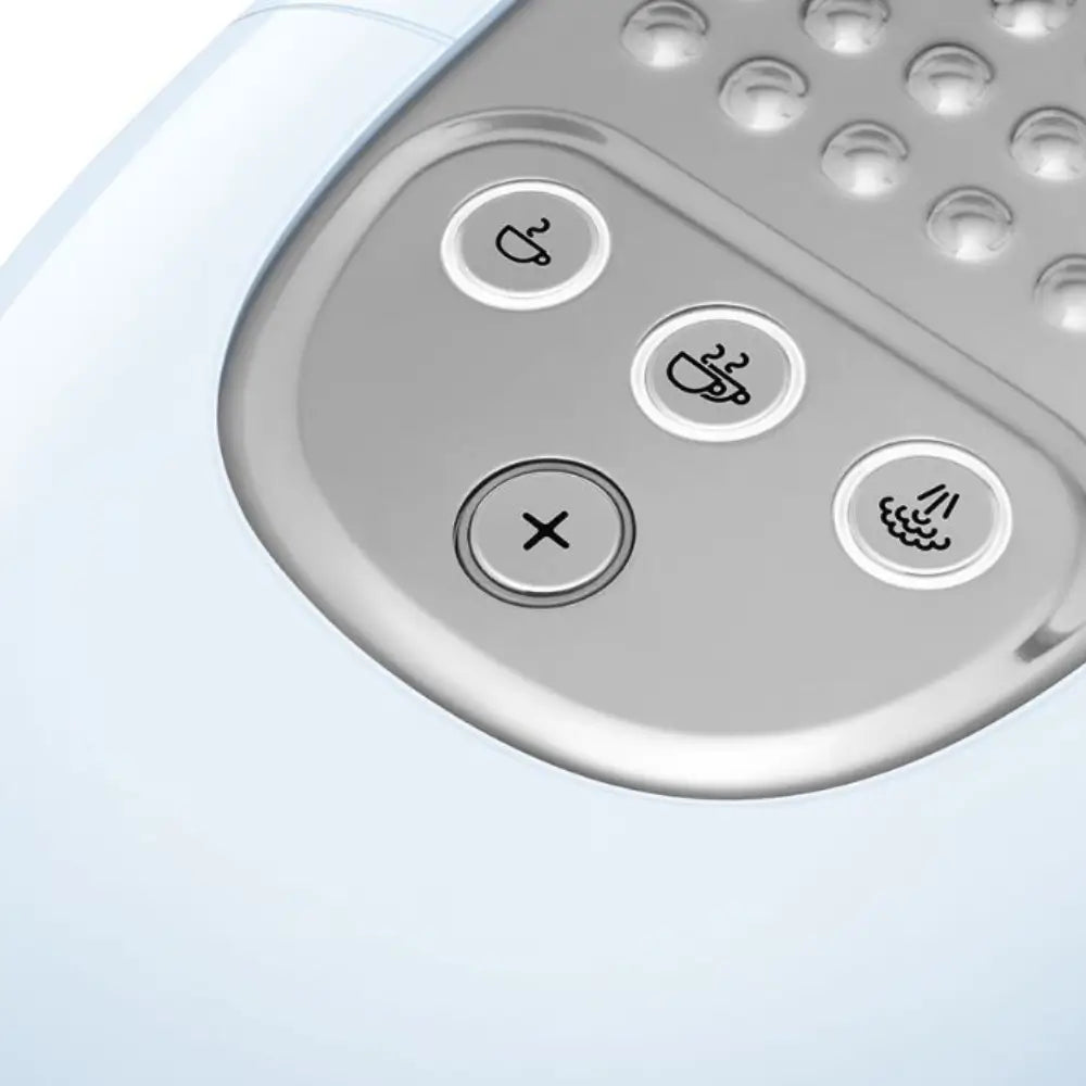 Extreme close-up of the illuminated control buttons on the SMEG ECF02, showing icons for single, double espresso, and steam.