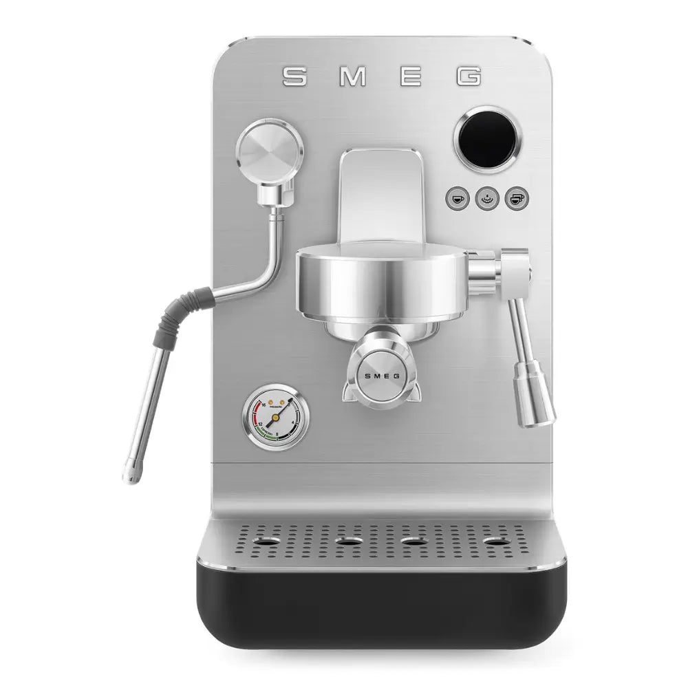 Front view of the SMEG Collezione Minipro espresso machine in silver and black with a pressure gauge.