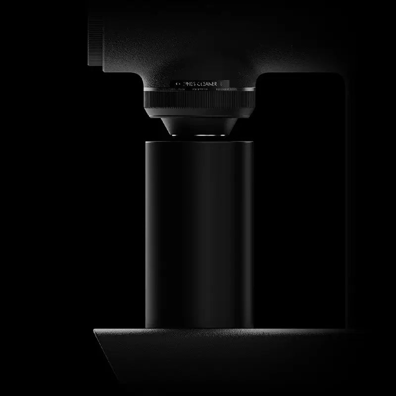 Close-up of Timemore Sculptor 078S grinder with magnetic catch cup.