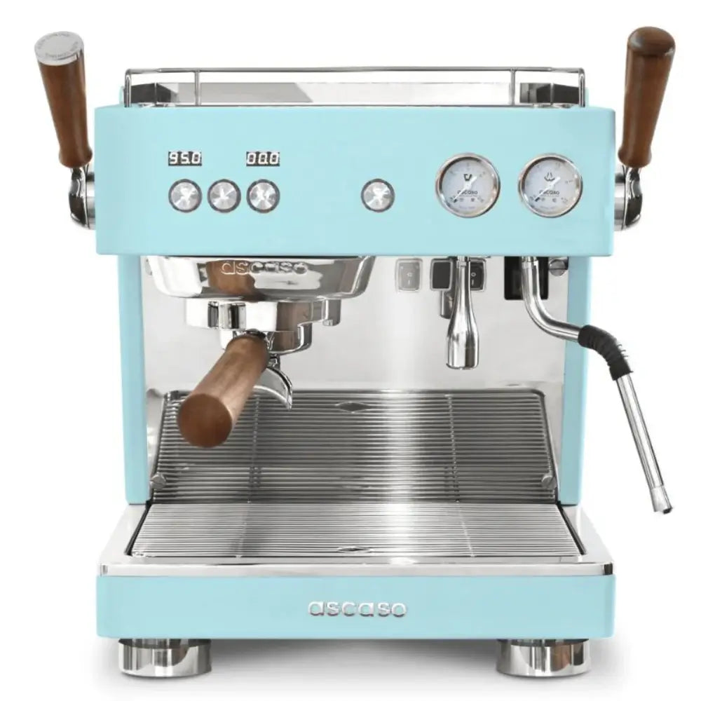 Front view of the Ascaso Baby T Plus espresso machine in skyblue with wooden handles, dual gauges, and polished metal finish, ideal for professional coffee setups.
