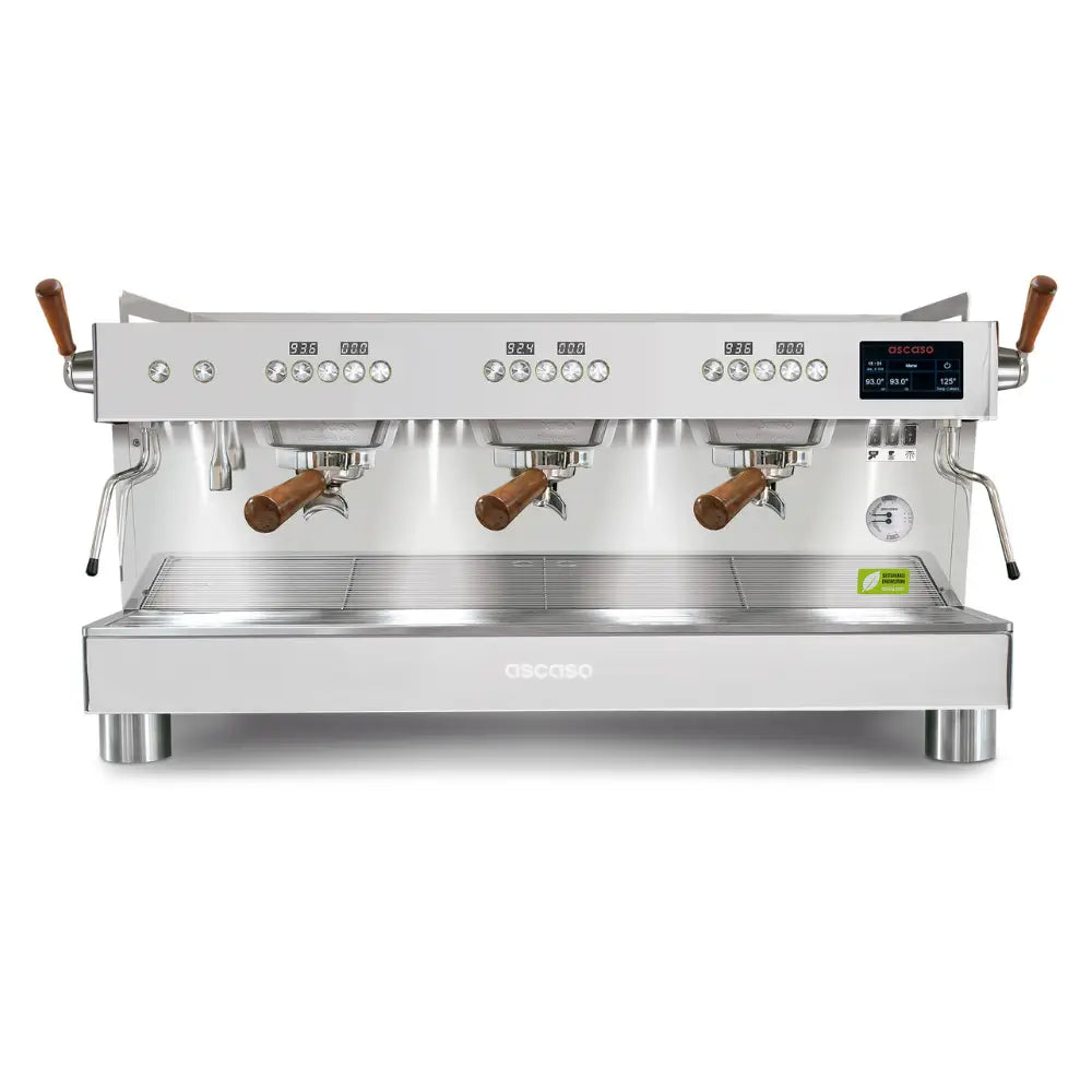 Front view of the Ascaso Barista T Pro 3 group espresso machine in silver with portafilter and digital displays.