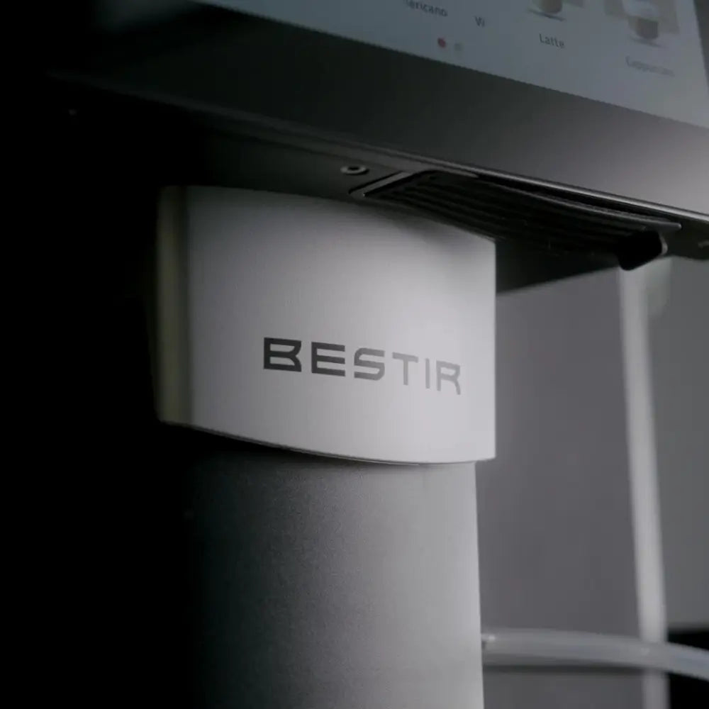 Close-up of Bestir BM40 coffee machine with brand logo on dispenser.