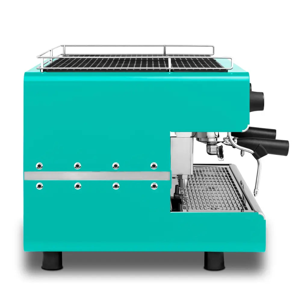 Side view of the blue Iberital IB7 Compact 2 Group espresso maker, showing drip tray.
