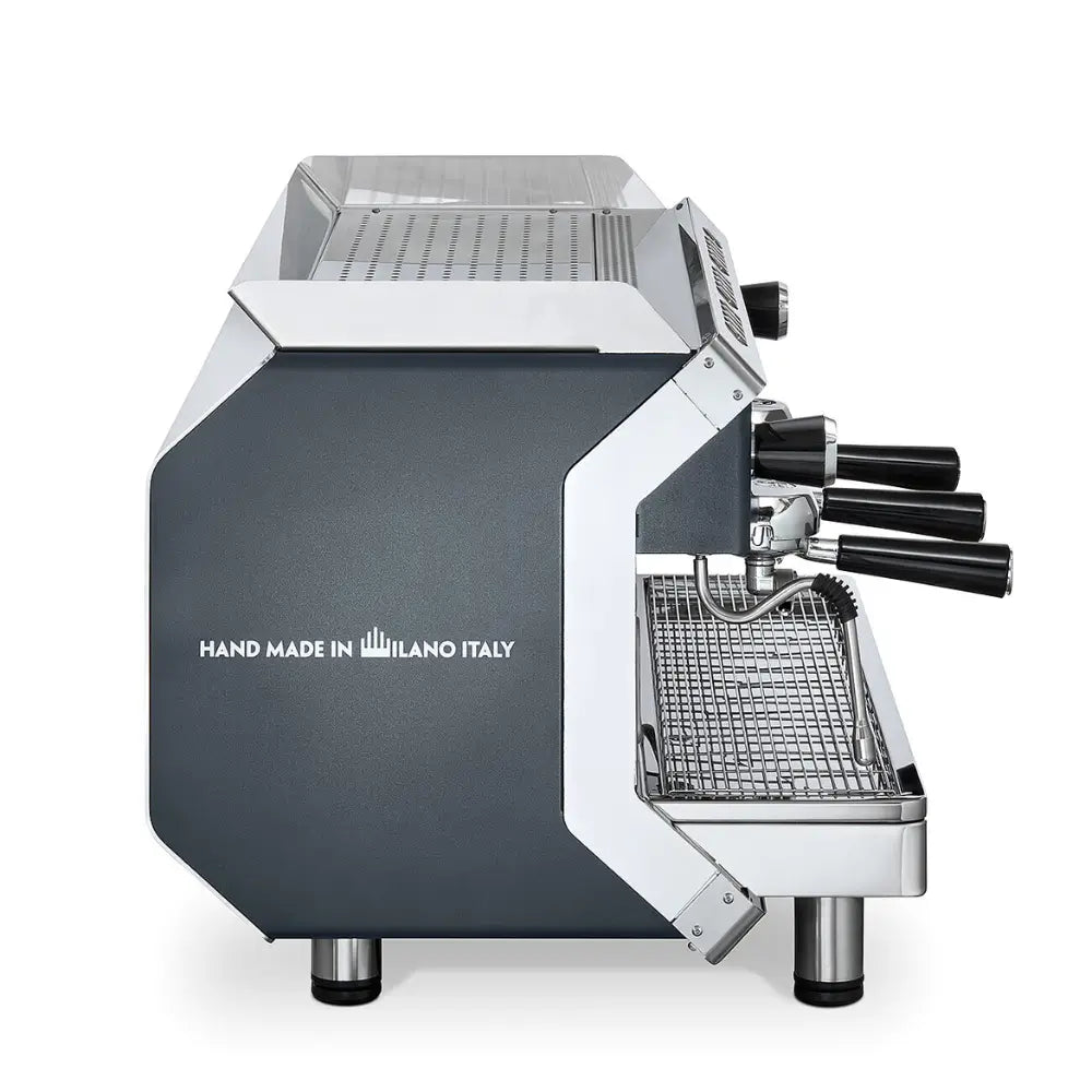 Side profile of the La Pavoni Geniale machine, highlighting the "Hand Made in Milano Italy" inscription.