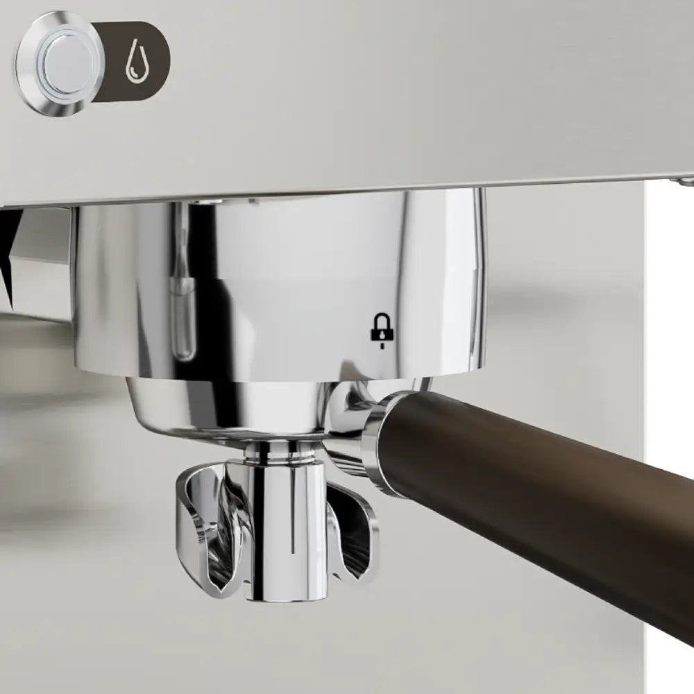 Detailed view of the portafilter locked into the grouphead of the Lelit Kate espresso machine.