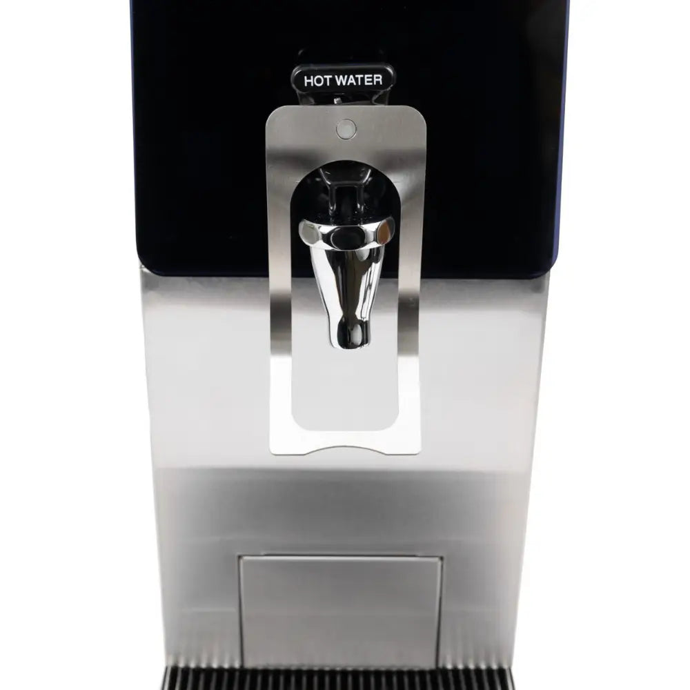 Close-up detail of the chrome dispensing tap on the Marco MT8 boiler, highlighting the protective guard and clear "HOT WATER" labeling for safety.