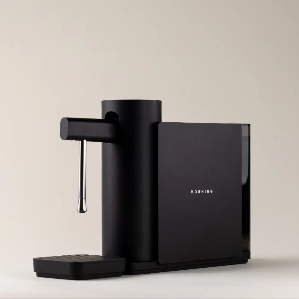 Angled view of the sleek black Morning Dream Milk Steamer 220v.