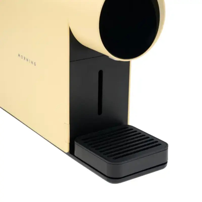Close-up of the Morning Mini Coffee Machine 220v in dawn finish showing drip tray design.