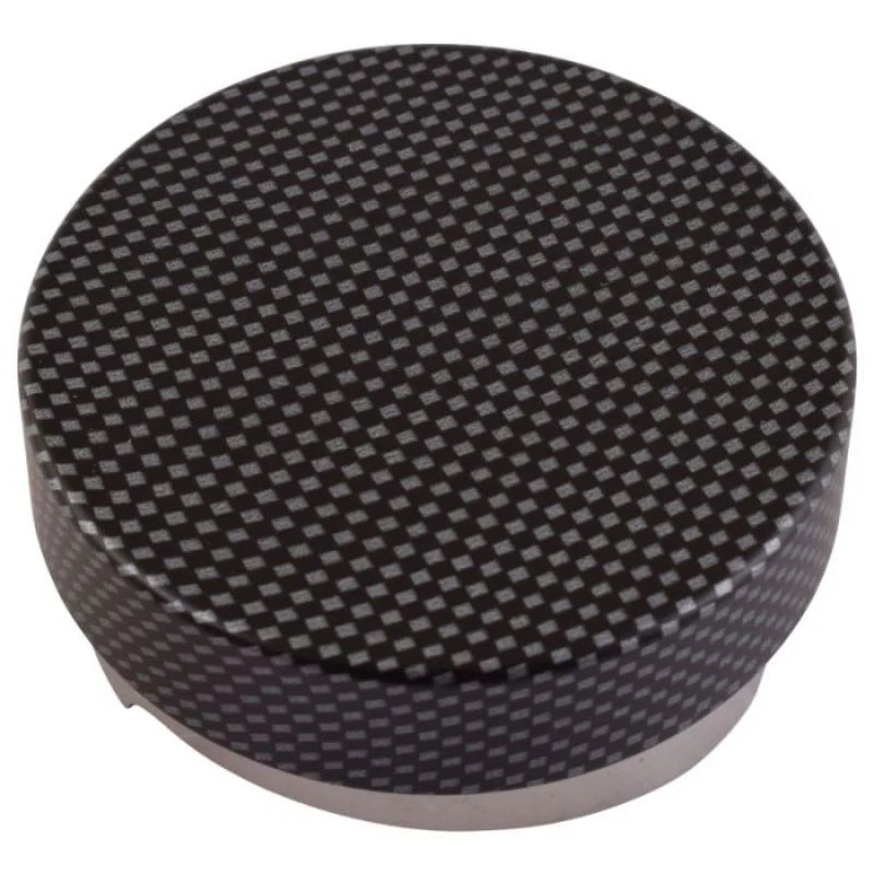 Top view of the Motta 58mm coffee levelling tool with a textured carbon-look finish