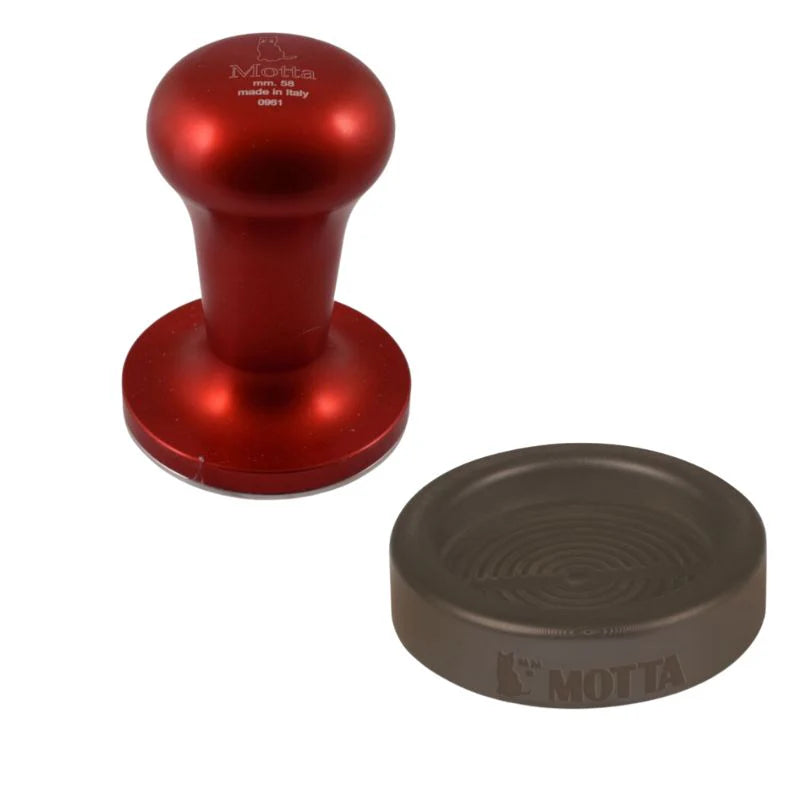 Front view of the red Motta Flash coffee tamper with matching rubber holder