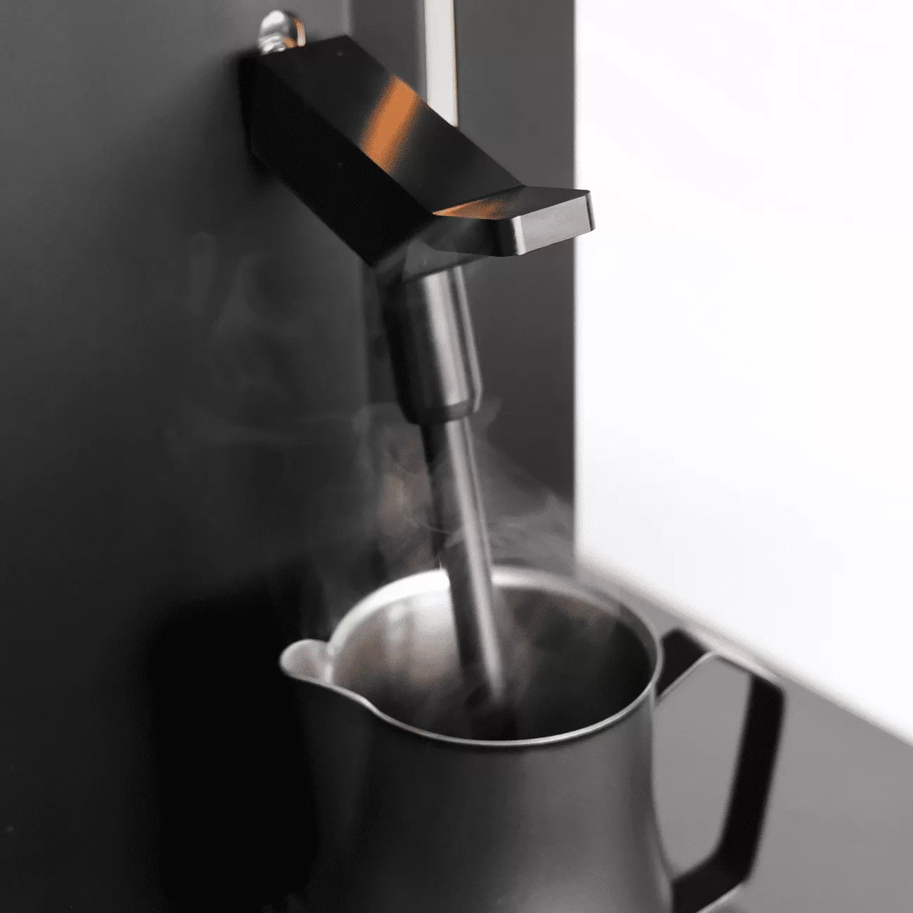 Close-up of the Rex-Royal s500 coffee spout with sensor and steam wand