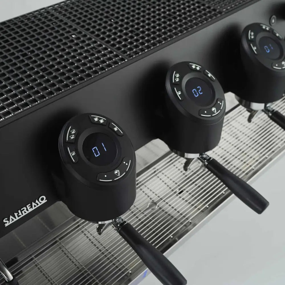 Close-up of the Sanremo D8's innovative digital group heads and shot timer display.