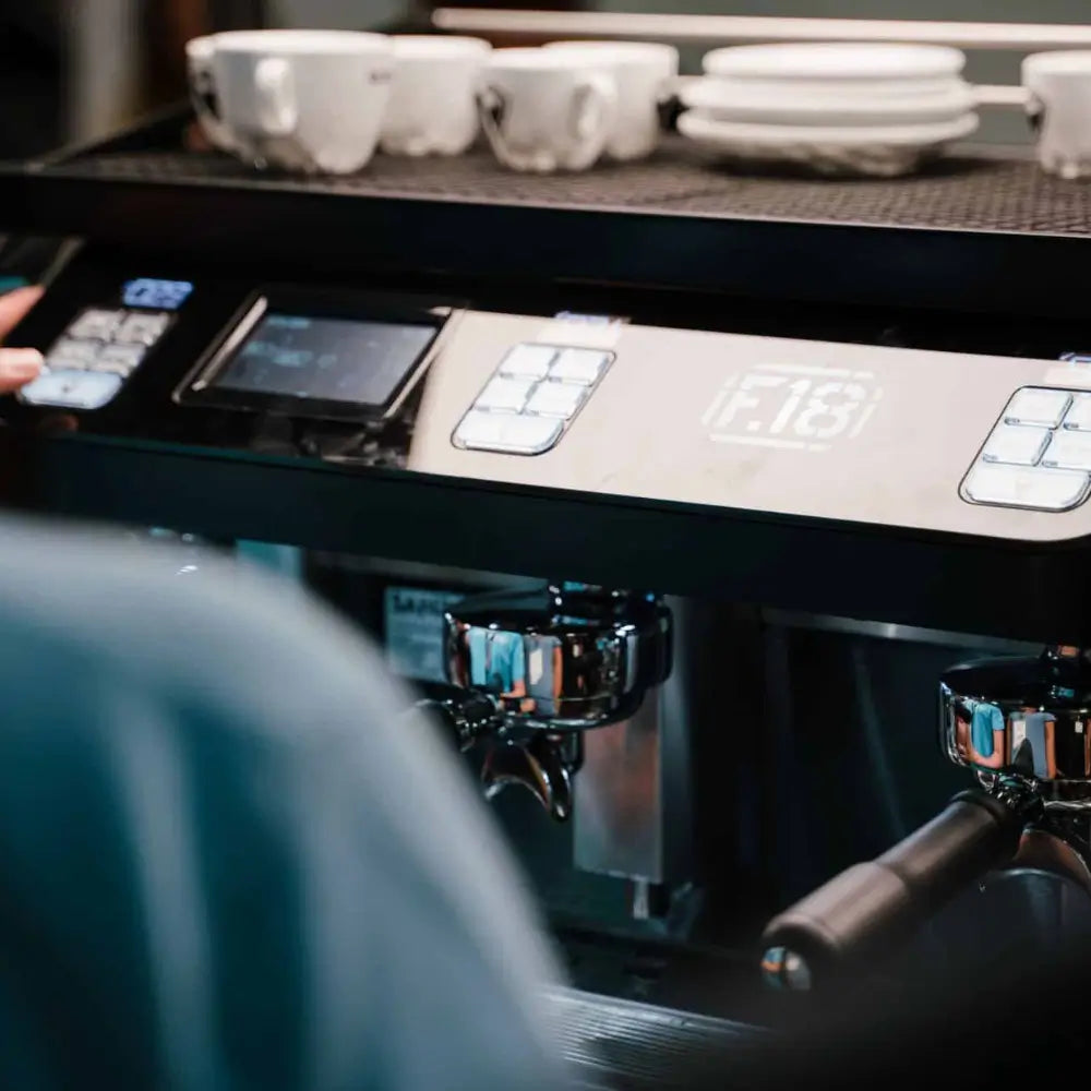 Close-up of the Sanremo F18's control panel, showing the main digital screen and programmable group buttons.