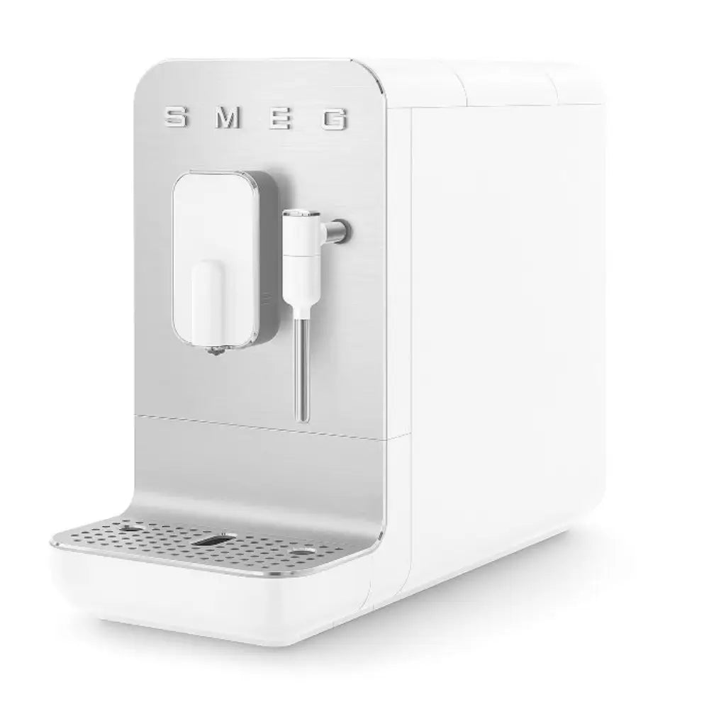 Angled view of the SMEG BCC12 in an all-white finish, highlighting the steam wand functionality.