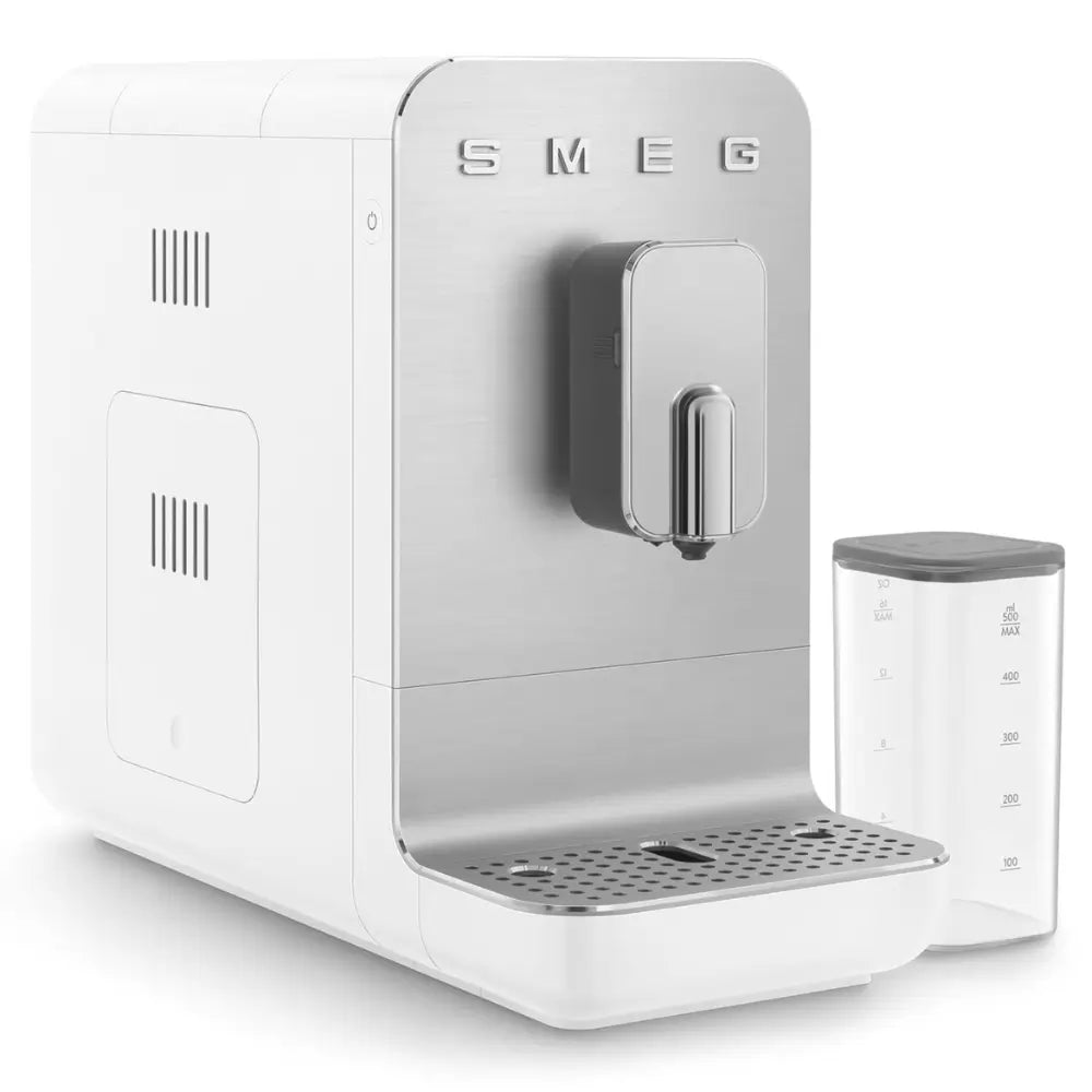 Angled view of the SMEG BCC13 in white with its external container, ready for integrated milk frothing.